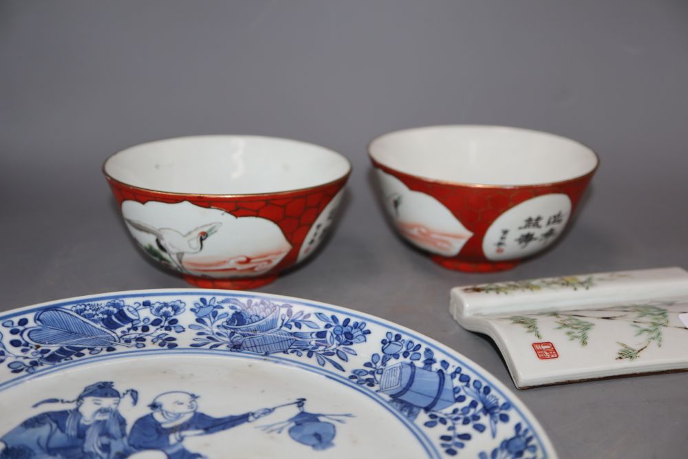 A group of four Chinese ceramics, two bowls, plate and chopstick stand